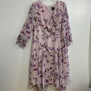 A gorgeous floral dress, with sheer sleeves.